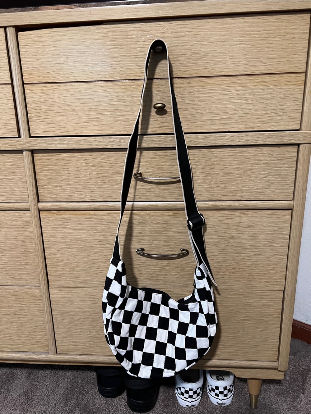 Checkered crescent bag